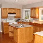 Oak Cabinets and Stainless Steel