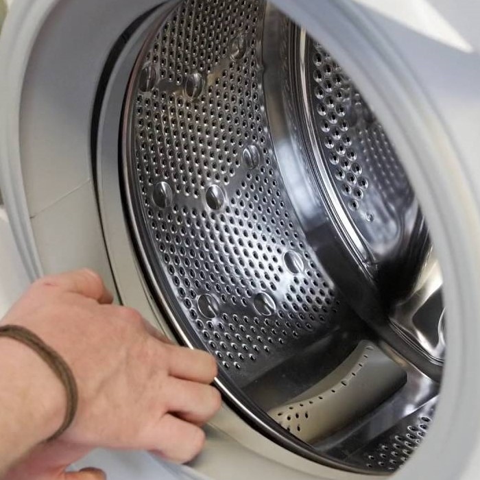 fix a noisy washing machine when spinning