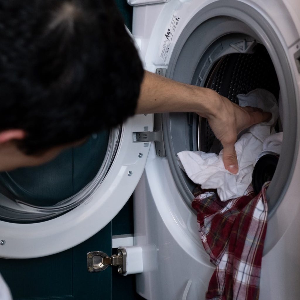 dryer not drying clothes but getting hot