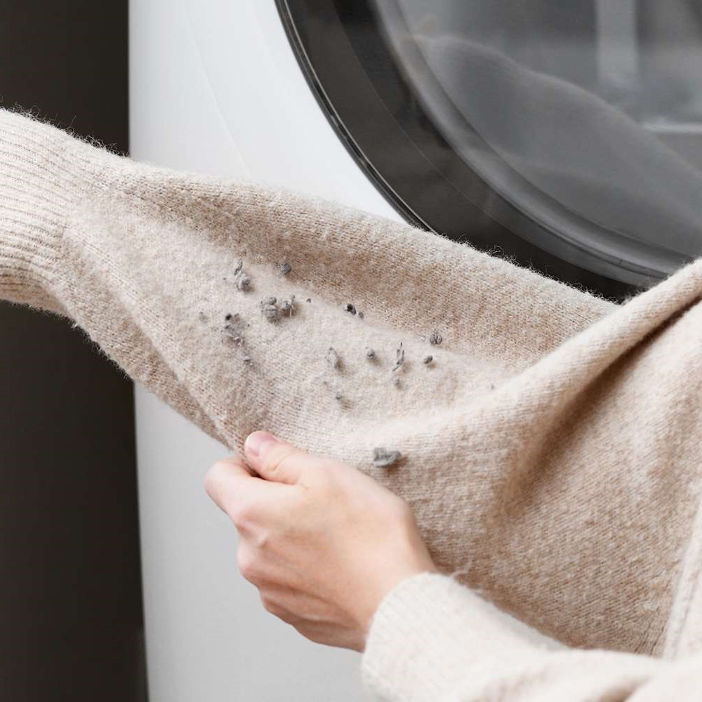 get lint off clothes in dryer